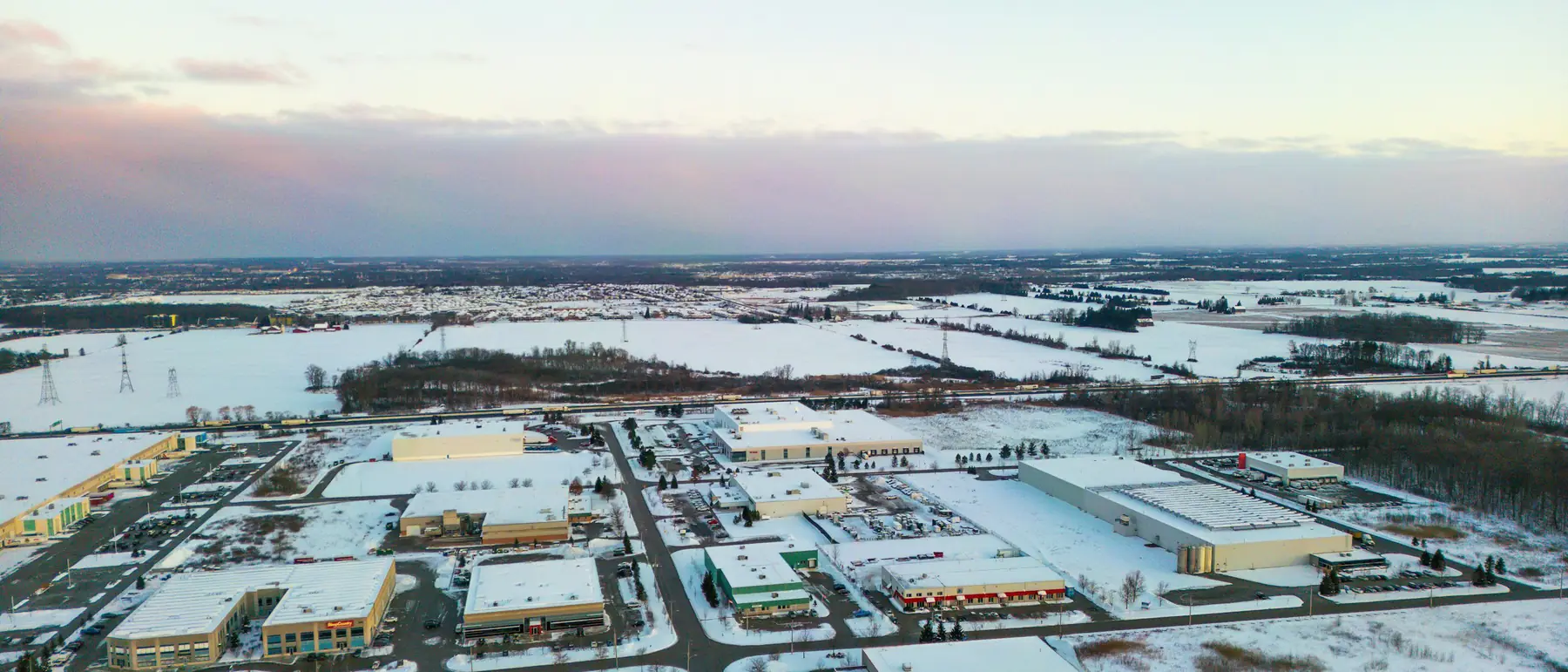 Aerial view of a distribution district under snow