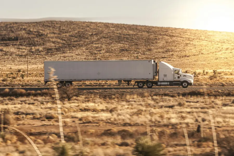 A transport truck on a rural highway