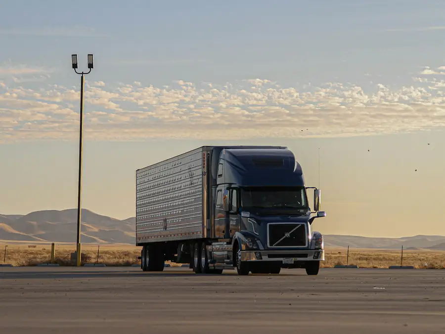 A tractor unit and trailer on an open highway
