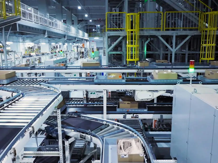 Cartons moving along a factory conveyor line