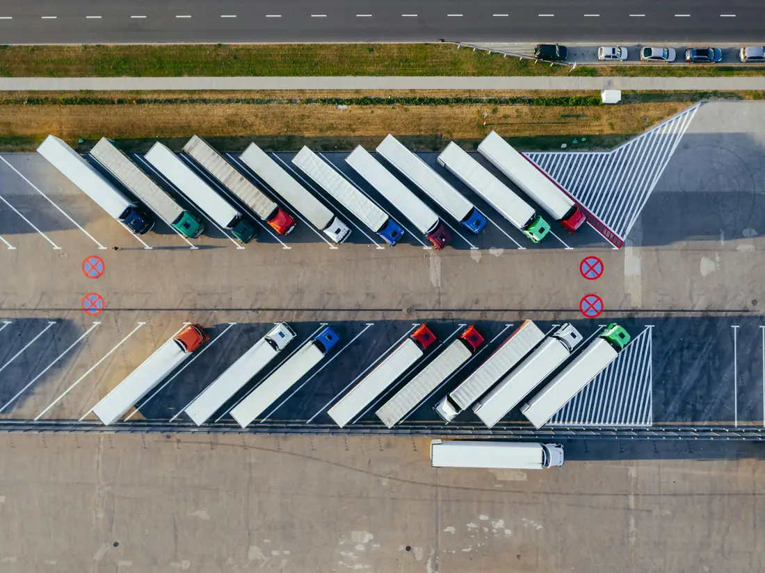 Aerial view of trailers backed into distribution centre dock doors